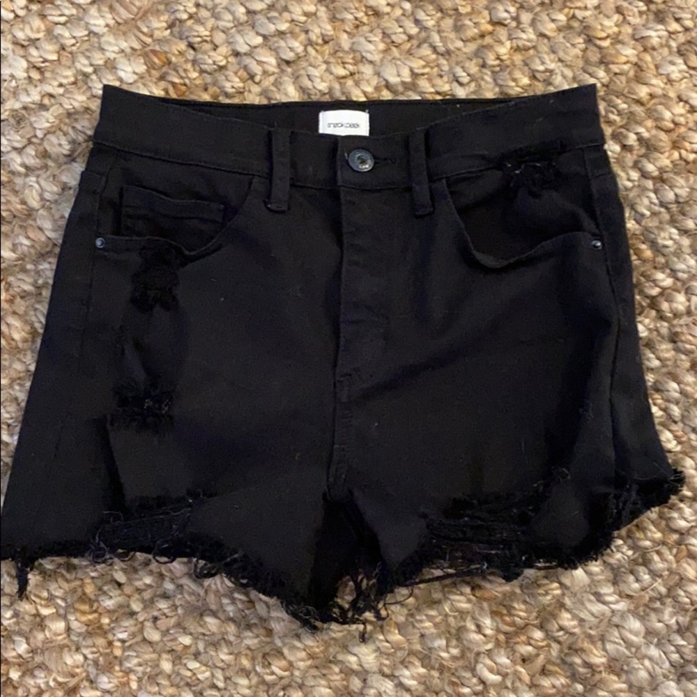Black distressed jean shorts